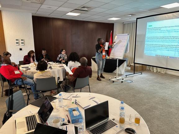 Workshop participants engage in group activities